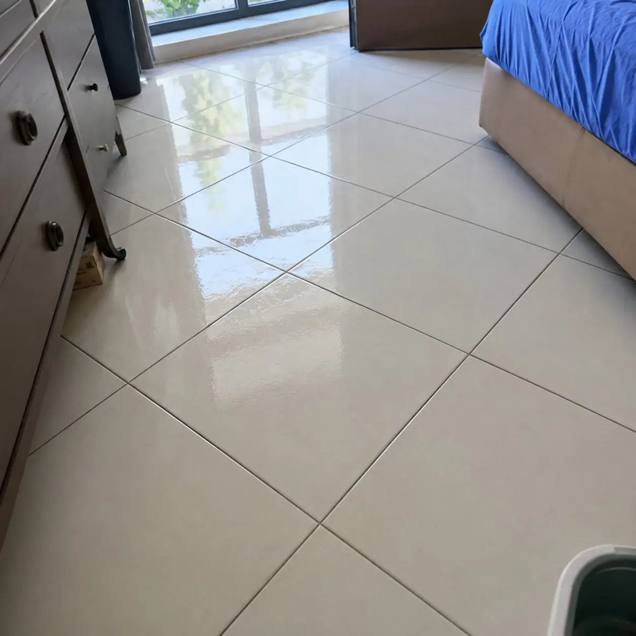 Freshly cleaned glossy tile floor